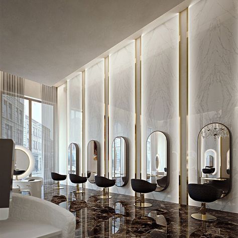Agencement pour un salon de coiffure moderne et luxueux : Cet espace met en valeur un agencement épuré et haut de gamme, idéal pour un salon de coiffure raffiné. Les postes de coiffure sont alignés avec des miroirs aux contours incurvés, fixés sur des structures murales rétroéclairées. Ces murs, réalisés en matériaux effet marbre, créent un contraste élégant avec les sièges au design minimaliste et les finitions dorées. Le sol en marbre brillant reflète la lumière naturelle et artificielle, amplifiant la luminosité et l’éclat de l’ensemble. Chaque poste a été conçu pour garantir confort et fonctionnalité, alliant mobilier ergonomique et matériaux de qualité. L’éclairage est intégré dans des panneaux verticaux pour offrir une lumière douce et homogène, essentielle à une expérience professionnelle optimale. Ce design contemporain est le fruit d’une précision technique et d’un savoir-faire artisanal, parfait pour les espaces dédiés au luxe et au bien-être.