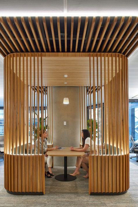 Bespoke Retail for a Coworking Center. Tailored design for a coworking space, including a designated area for coffee breaks or shared meals, harmoniously integrated with the working zones. The light wood used throughout and the continuation of the design with laminated wood on the ceiling create a seamless visual flow, strengthening the cohesion of the entire space. Every aspect, from the furniture to architectural elements, is designed to enhance functionality while promoting an elegant and collaborative vibe.