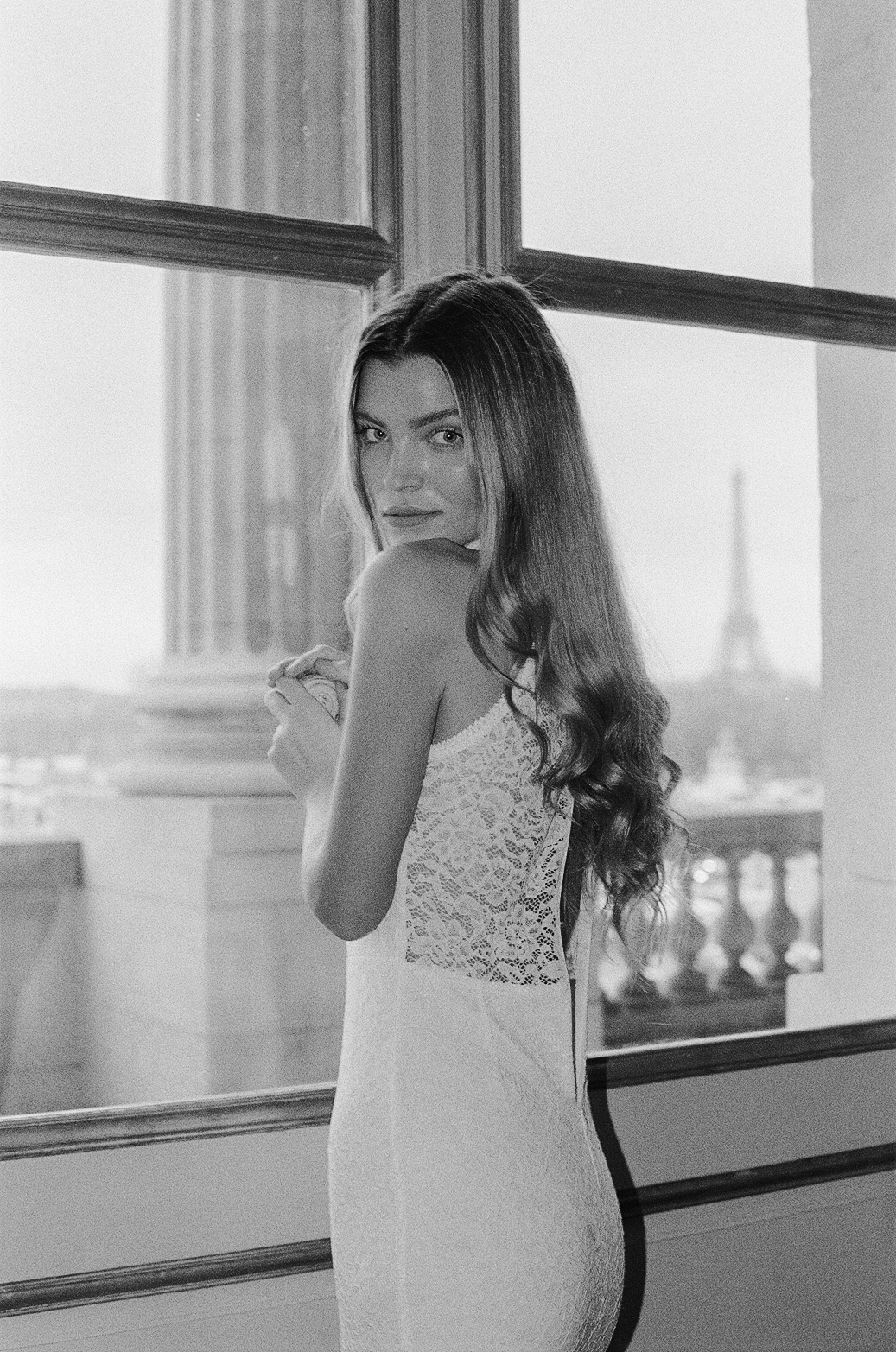 elopement photoshoot in a Parisian interior with Eiffel Tower view by photographer Anya Parsley