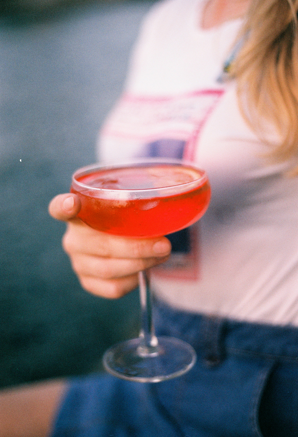 Aperol spritz glass captured on analog film by Anya Parsley