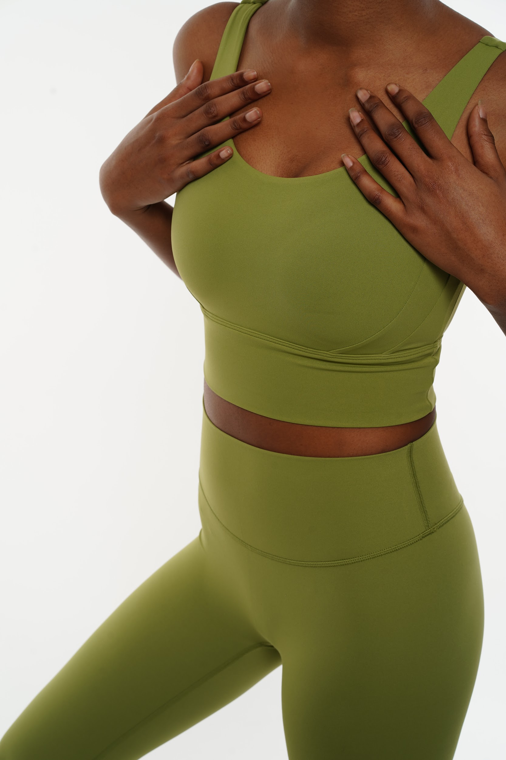 Close-up photo of a model in athletic wear, highlighting texture and color under Paris studio lighting