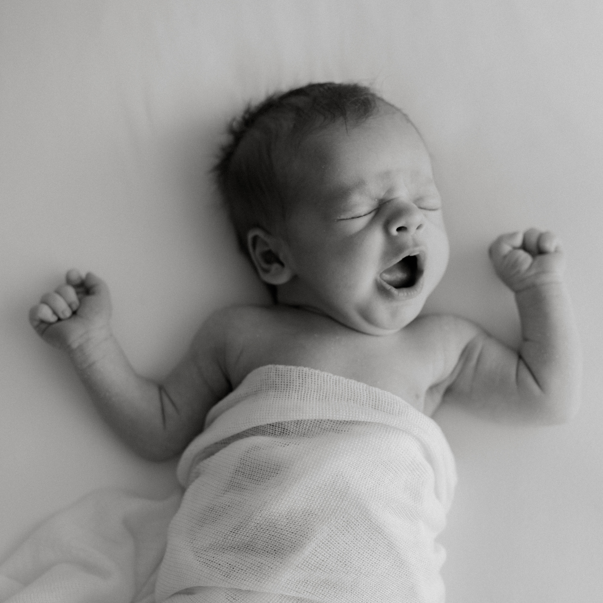 cute newborn baby yawning photo