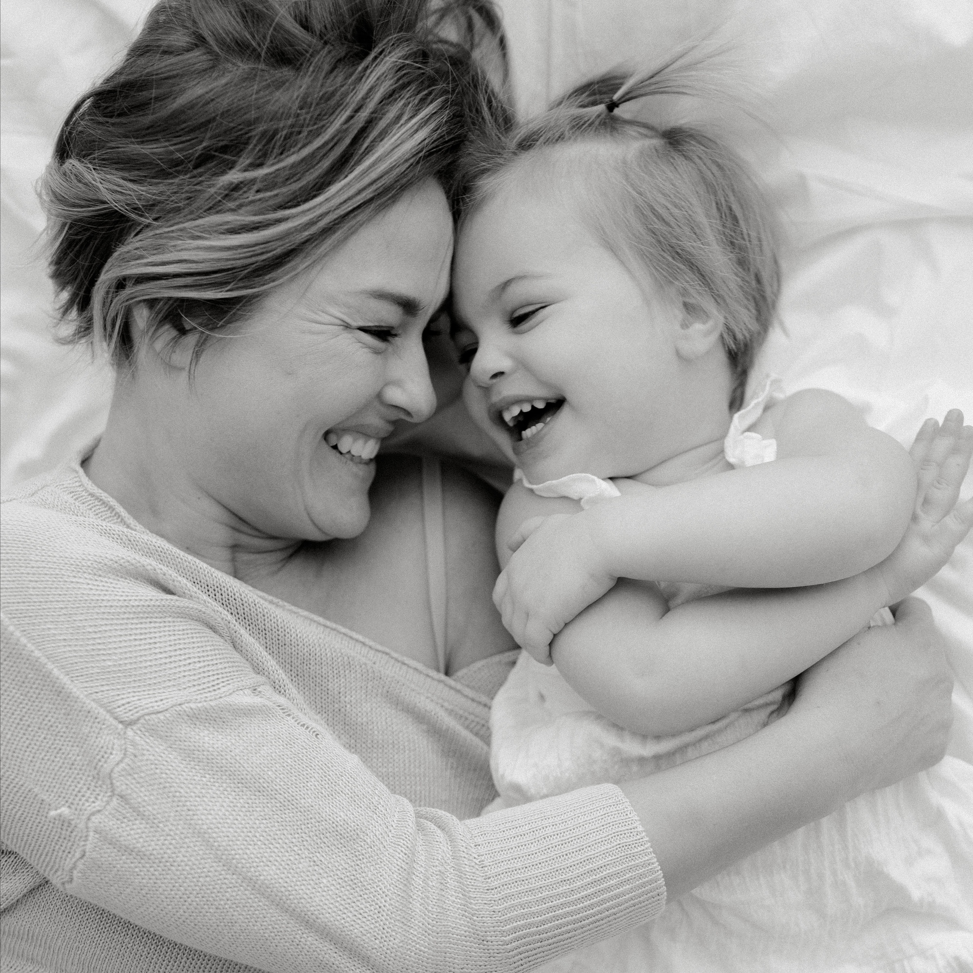 mommy and baby girl laughing photo