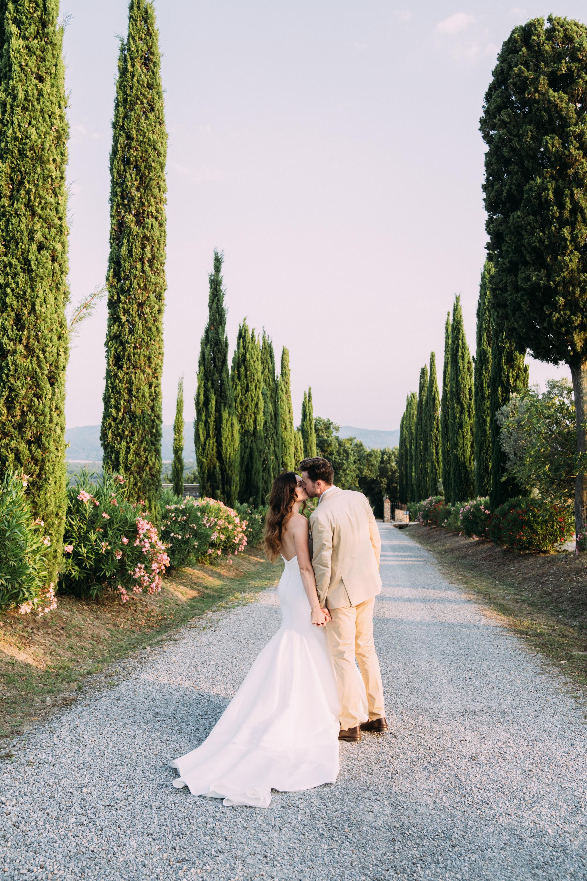 wedding photoshoot with Cypress trees in Tuscany