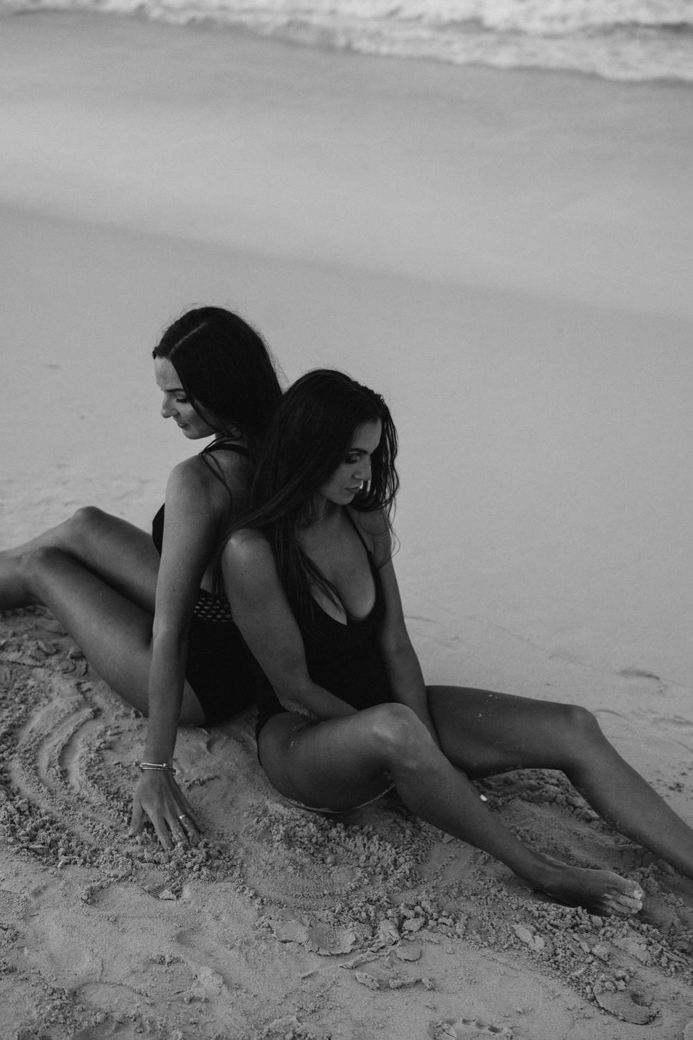 Two women on a sandy beach