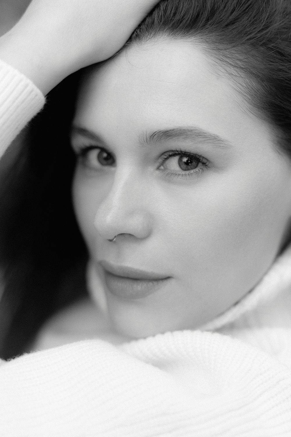 Close black and white portrait of a woman