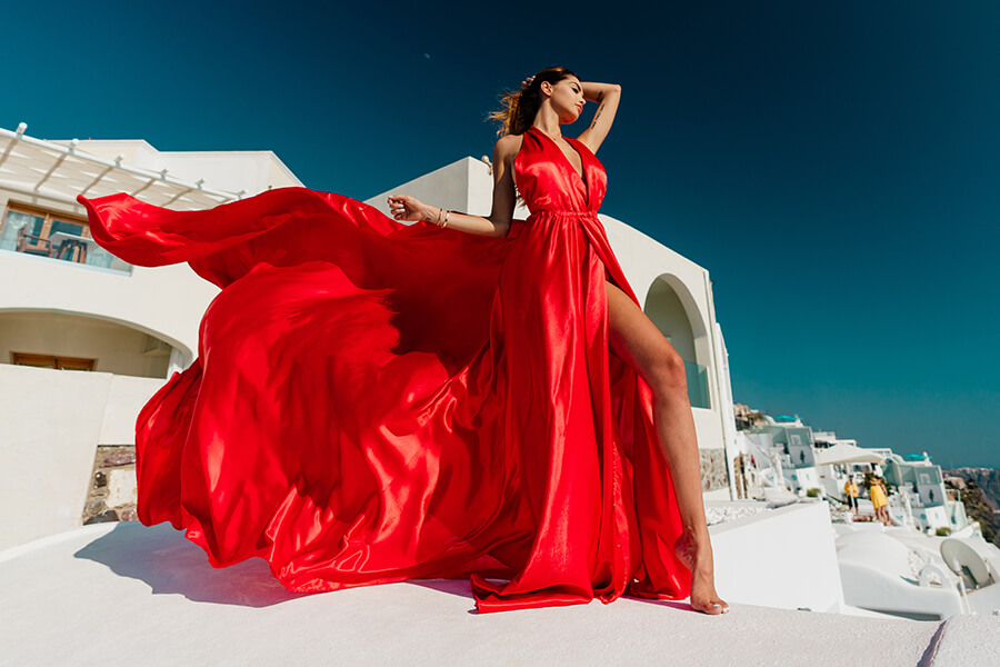 flying red dress santorini Red dress on Santorini - bold, timeless, unforgettable  Against white  streets and blue domes, red creates a strong contrast that catches every  eye. It's not just a color
