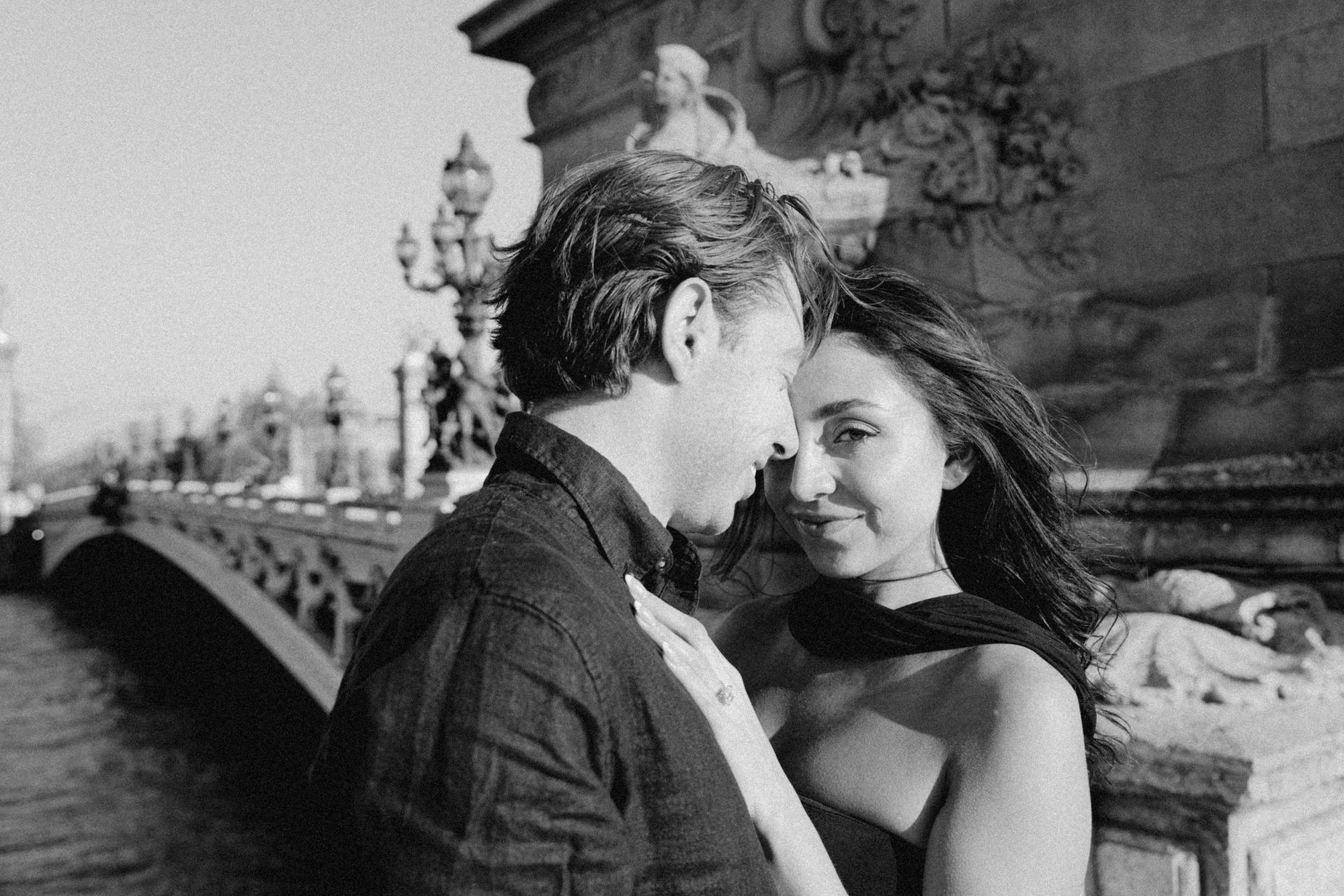 Dramatic black and white engagement portrait in the heart of Paris