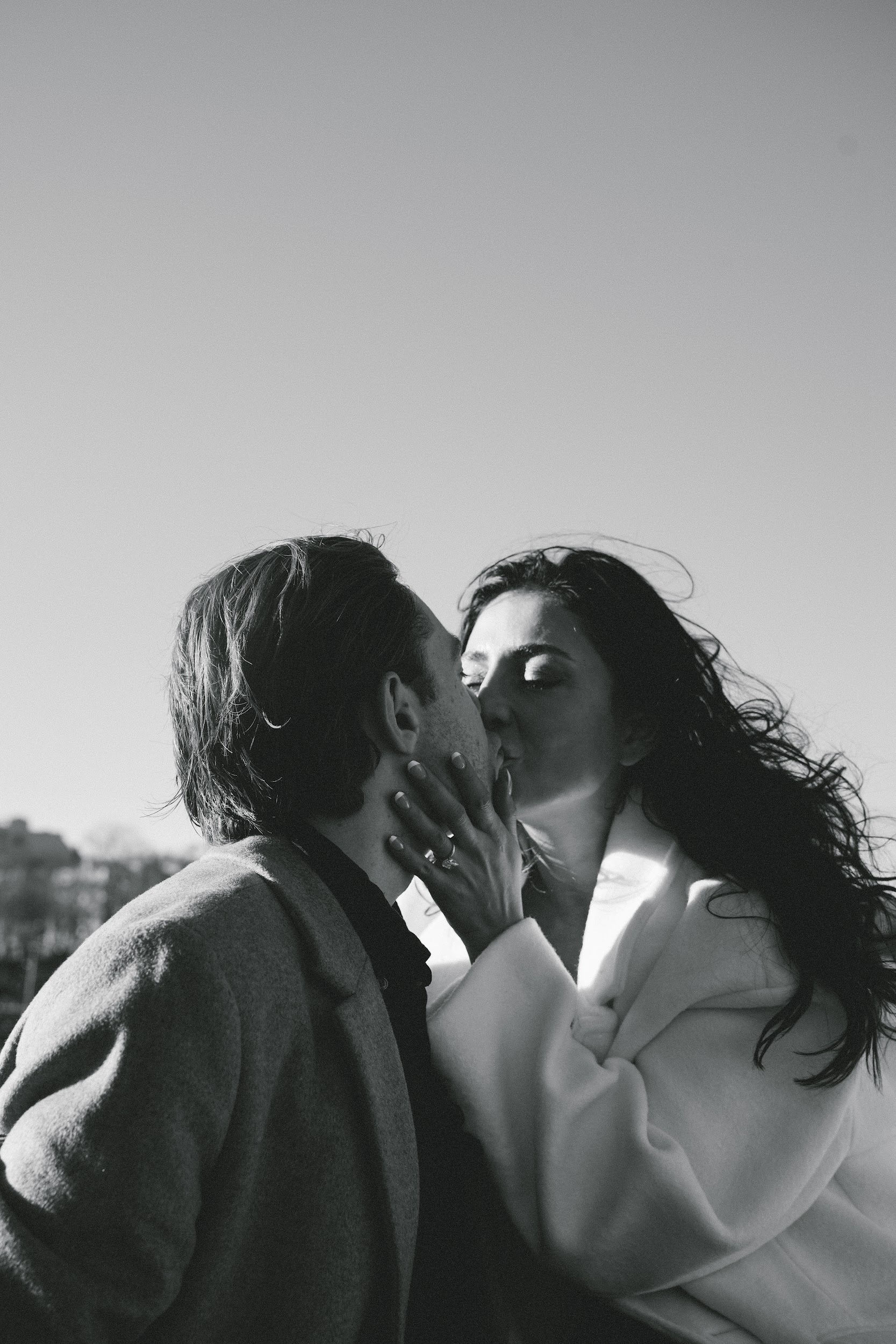 timeless black and white photo of a tender couple in love