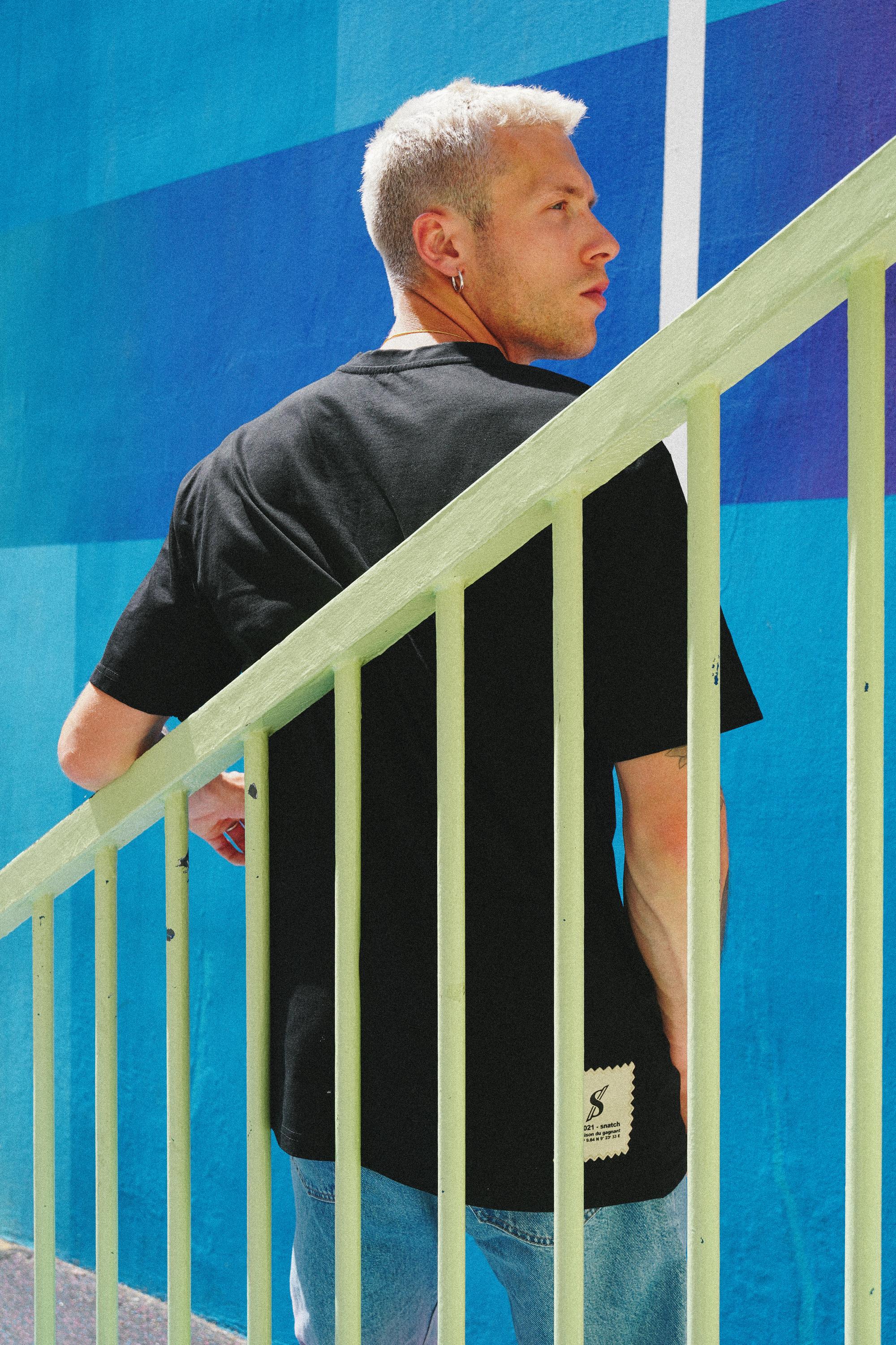SNATCH streetwear displayed at iconic Duperré basketball court in street style Paris shoot
