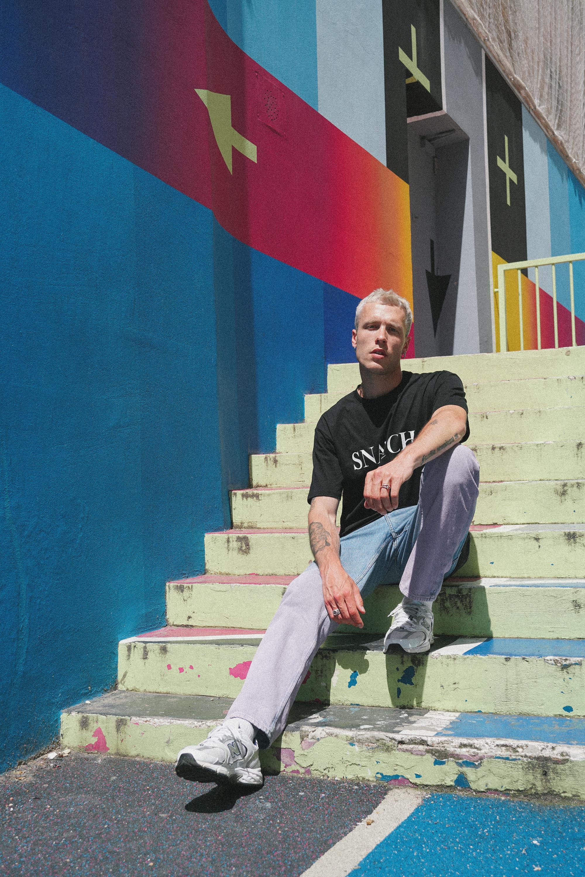 SNATCH streetwear displayed at iconic Duperré basketball court in street fashion Paris shoot