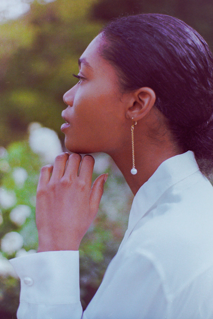 Profile of model wearing Gina Gant Pearls earrings by Paris Fashion Photographer Anya Parsley 