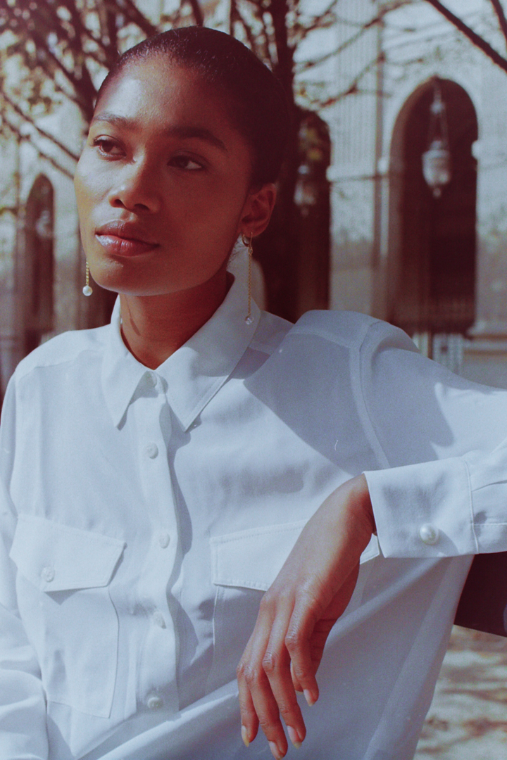 Serene model wearing Gina Gant Pearls jewelry, photographed on film by Paris fashion photographer for timeless appeal