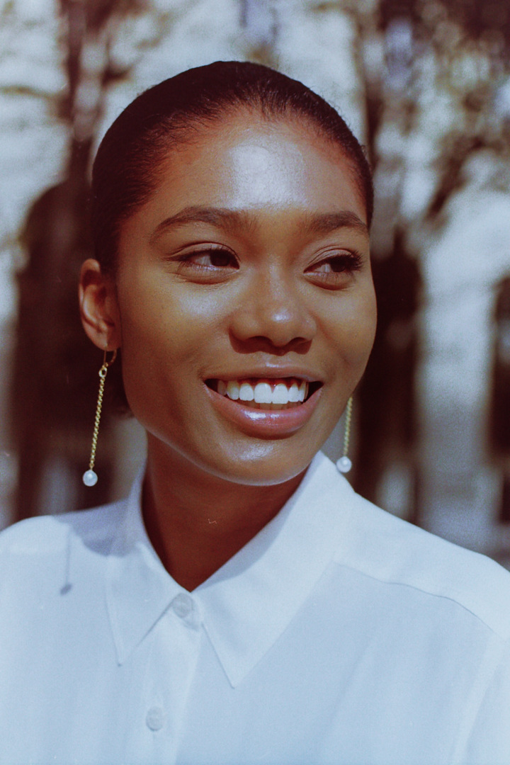 film photo of a happy model from pearl jewellery lookbook by Paris fashion photographer Anya Parsley