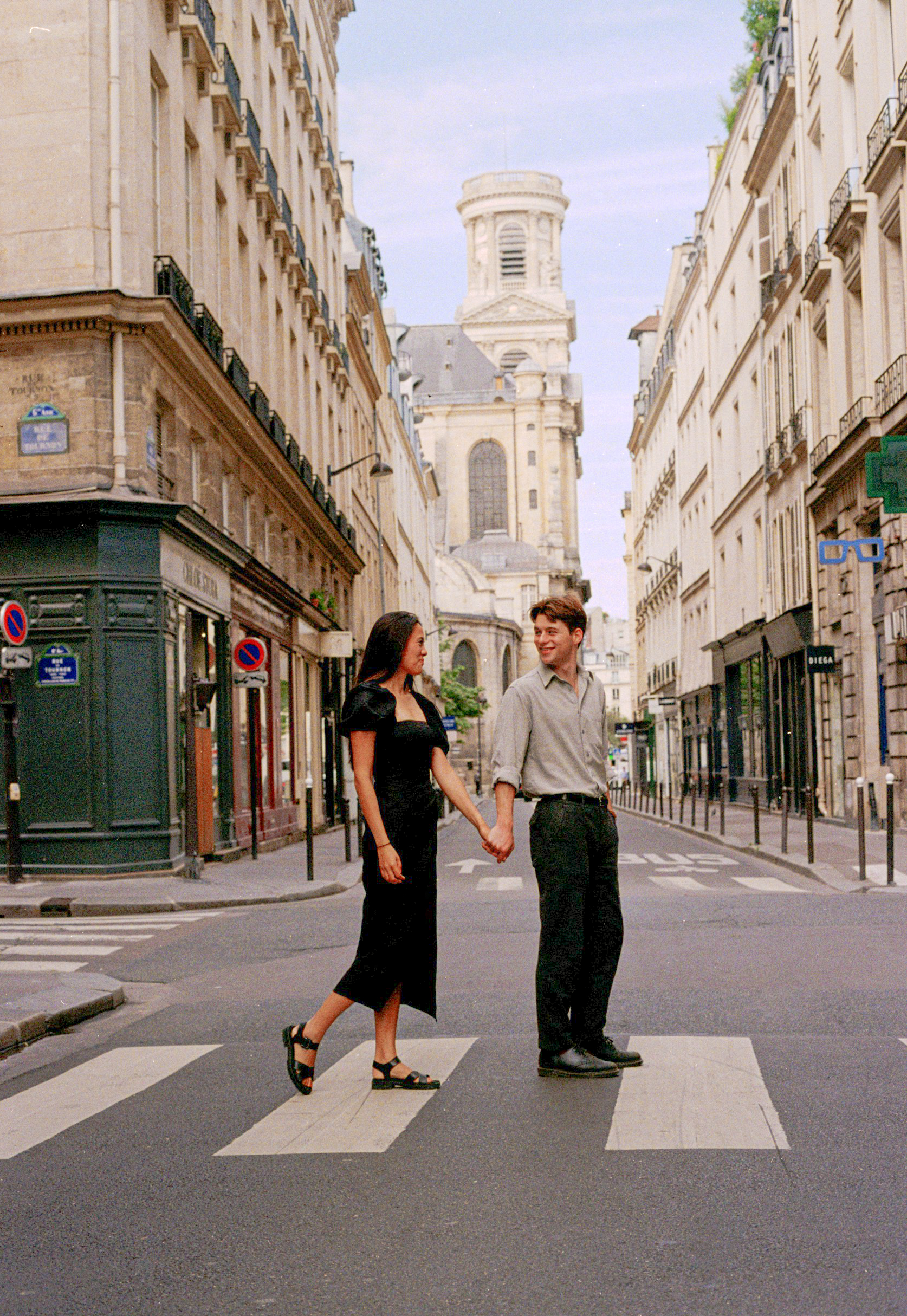 Engagement photo session on film at the streets of Saint-Germain-des-Prés district