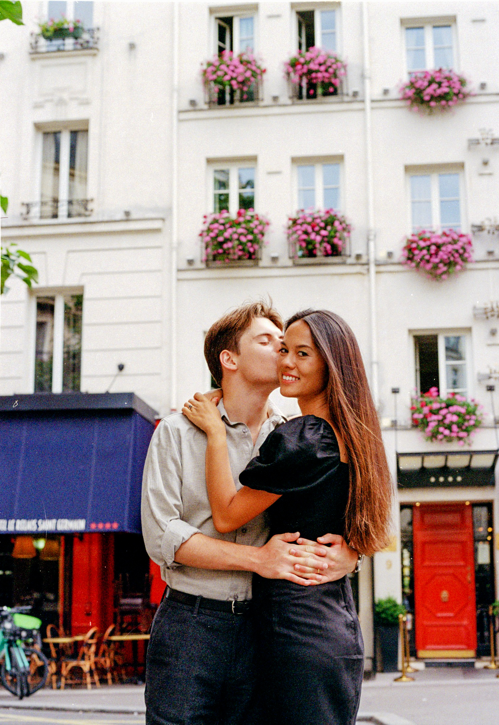 Couple captured in Saint-Germain-des-Prés area on film by engagement photographer in Paris
