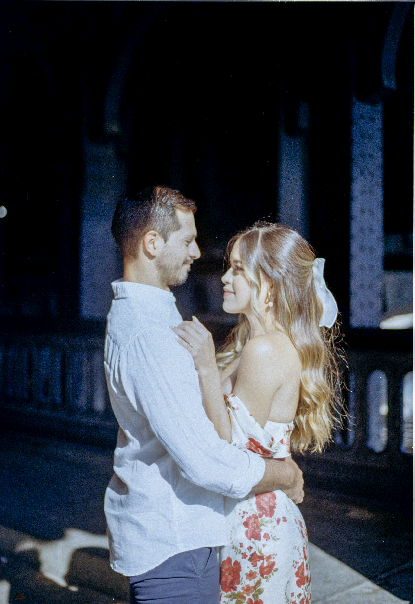 dramatic engagement photo of a couple in Paris captured on film