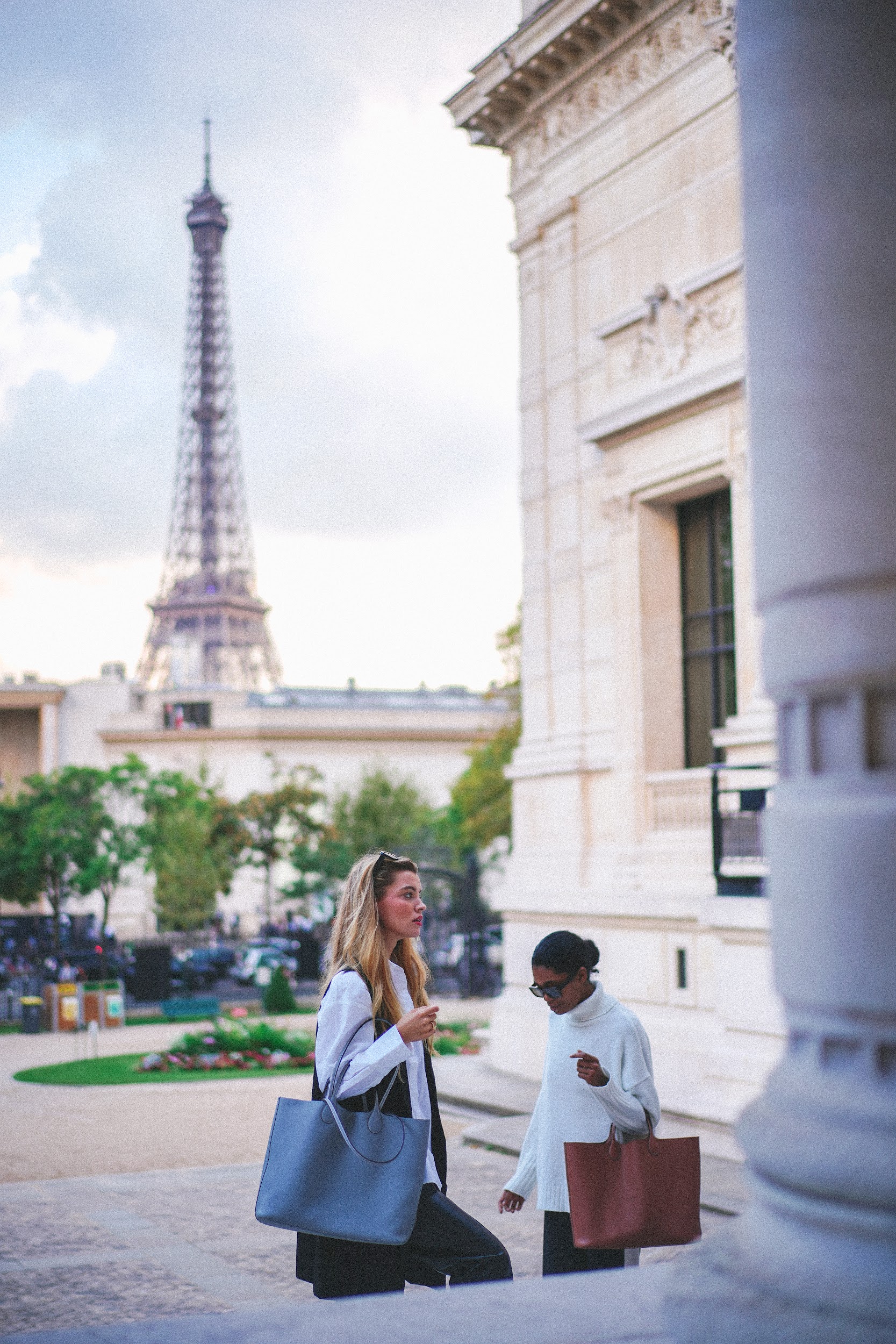 H.Pai leather goods displayed against the Eiffel Tower backdrop by Paris fashion photographer