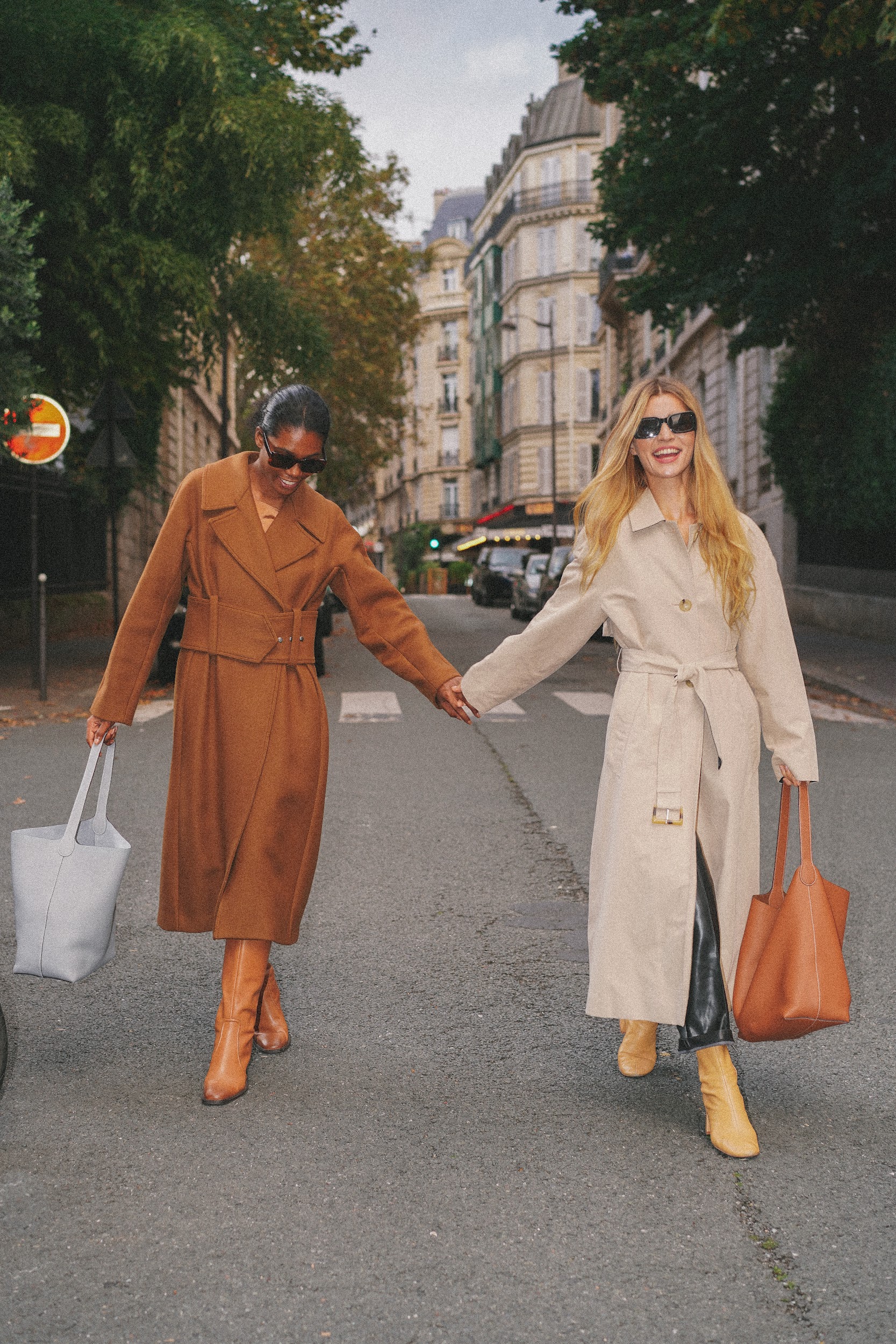 Paris fashion photographer creating joyful moments with H.Pai bags.